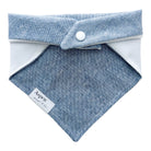 Back of dog bandana showing solid blue linen fabric with no embroidery and snaps to securely fasten around your pet’s neck.