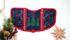 Navy blue and red embroidered Christmas Service Dog vest with holiday trees and lights, dual zipper pockets, and SERVICE DOG Ignore Me text on both sides