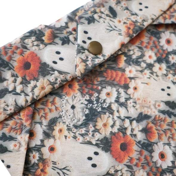 Close-up of snaps on the back of the Ghostie dog bandana for secure and adjustable fit.