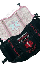 Two dog vests with emergency medical symbols and text on a white background created and designed by Aspen and Co.