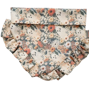 Dog bandana with ruffled trim featuring Ghostie design in autumn colors, decorated with small ghosts, foliage, and florals, made for a stylish and festive look