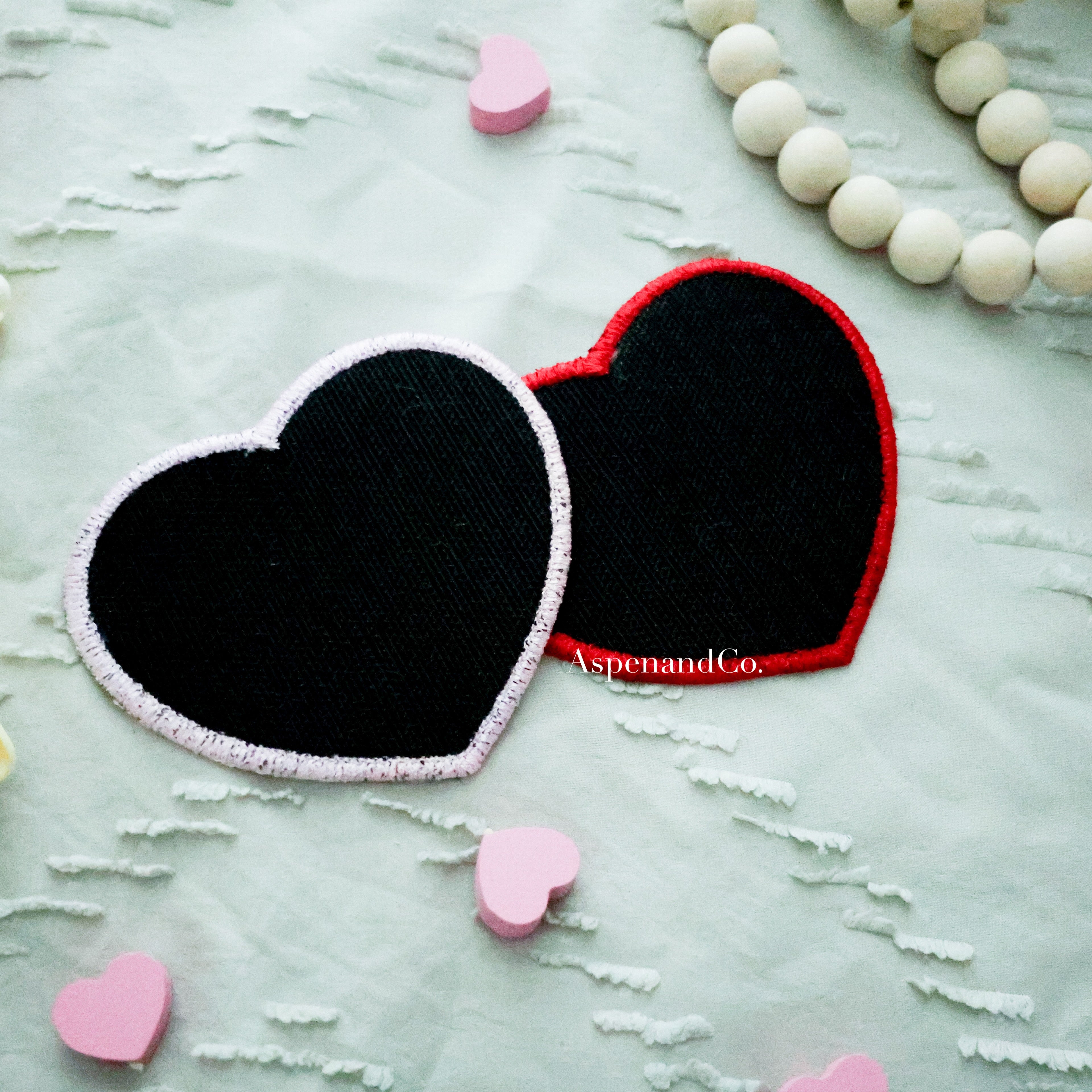 Side-by-side embroidered heart patches with 'DO NOT PET' text, showing the back with hook side