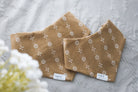 Two bandanas one size small and one medium in Ochre slip on dog bandana