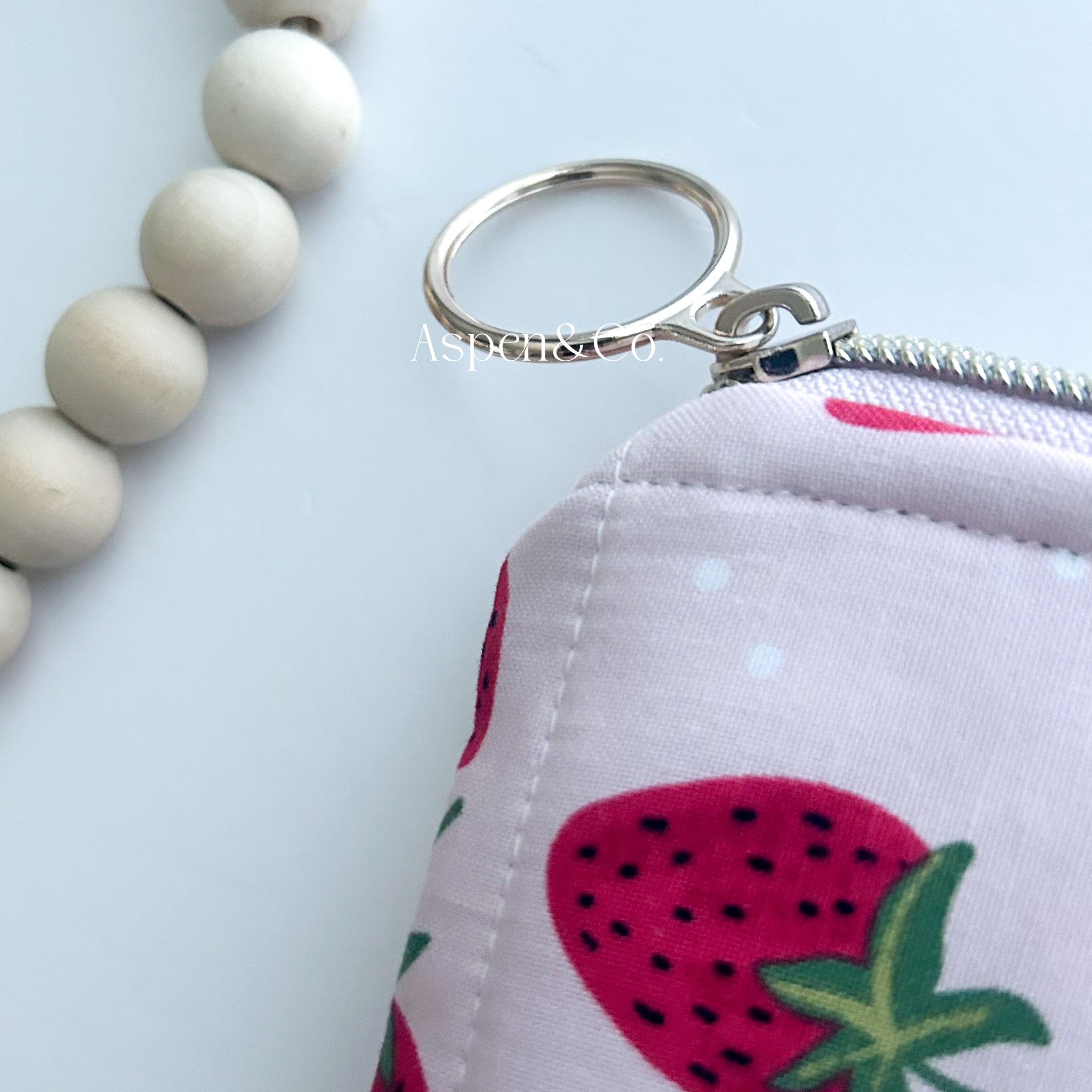 Handmade strawberry quilted book sleeve with zipper, zipper has cute ring design tab