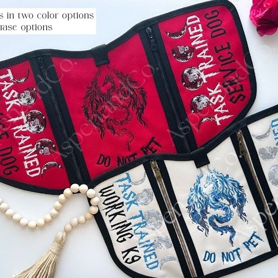 Red and ivory service dog vests with dragons