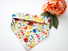 Wildflowers dog bandana by Aspen and Co. Handmade in Southern California featuring beautiful assorted wildflowers, this is a snap on dog bandana.Aspen and Co. offers dog bandanas, puppy bandanas,  dog portraits, dog mom shirts, waterproof bandanas, dog collars, dog birthday bandanas, and more.