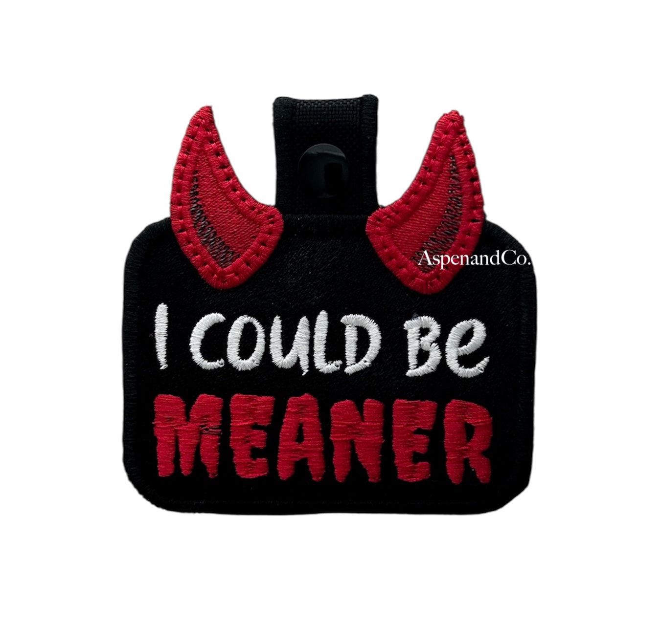 Embroidered “Could Be Meaner” snap patch tab with swivel clasp attached, black patch with red lettering and clean stitched backing, with snaps