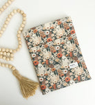 Front view of Ghostie book sleeve with ghost prin