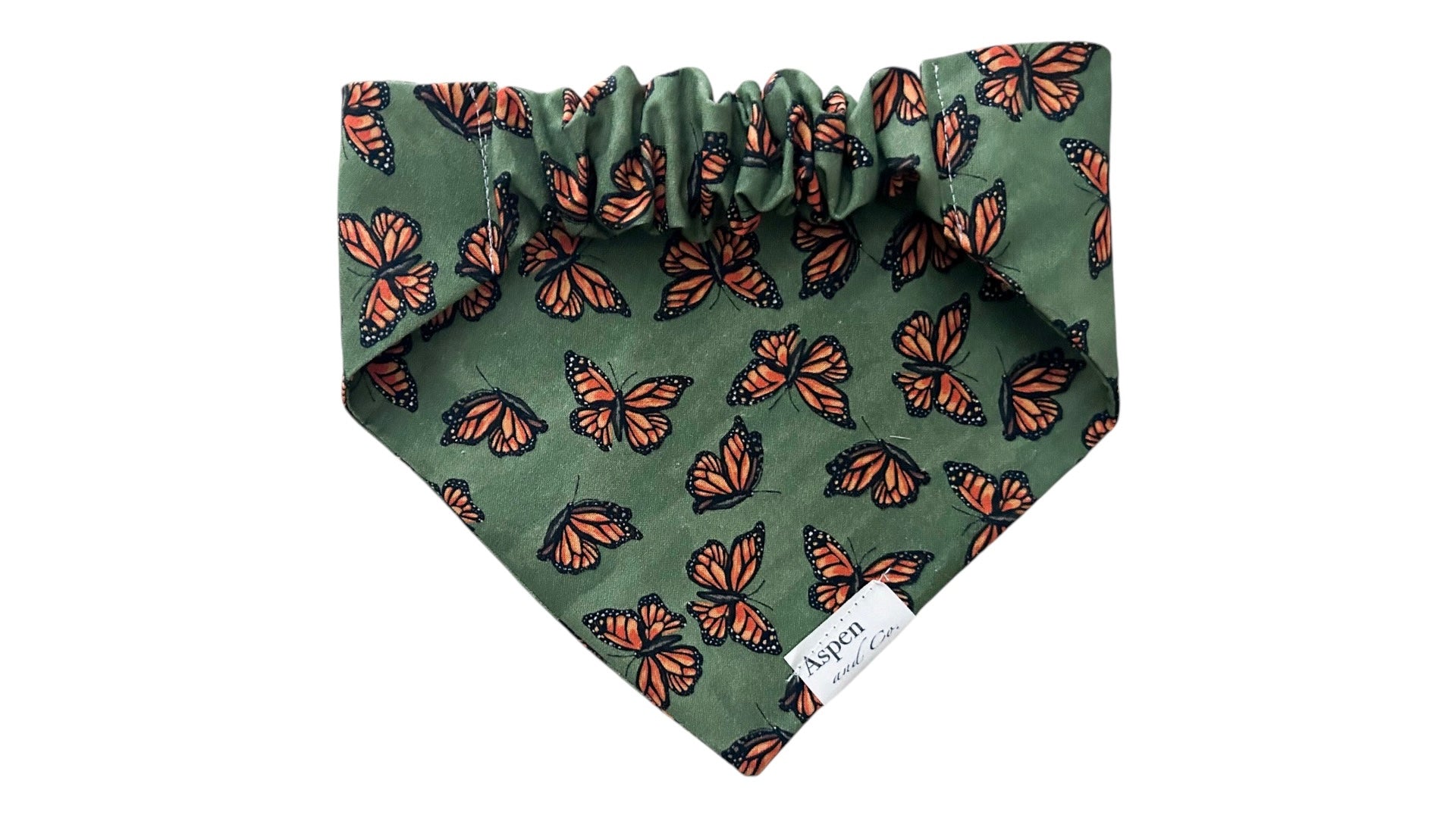 Back view of olive monarch butterfly scrunchie slide-on dog bandana showing elastic scrunchie collar slide-on