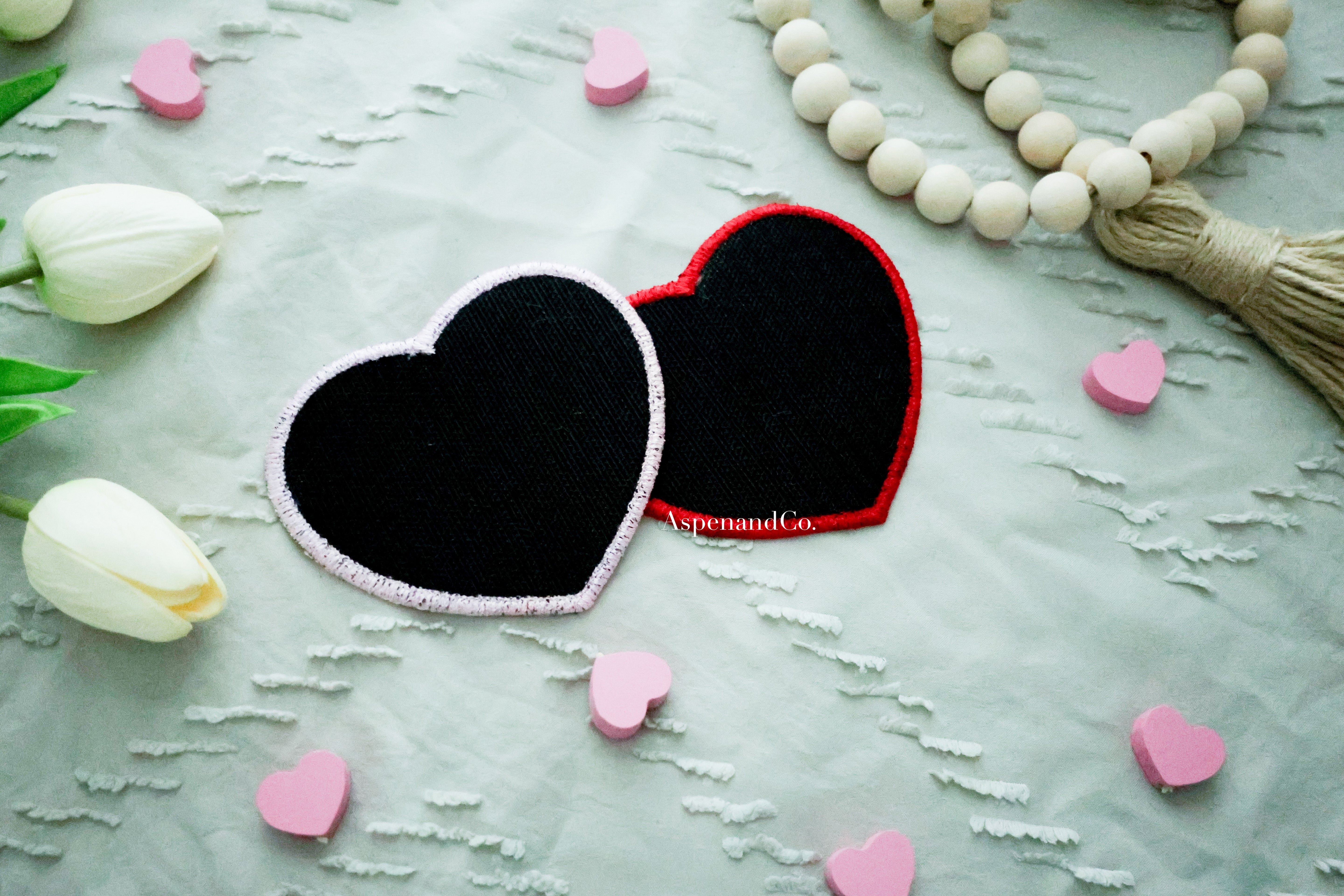 Side-by-side embroidered heart patches with 'DO NOT PET' text, showing the back with hook side 