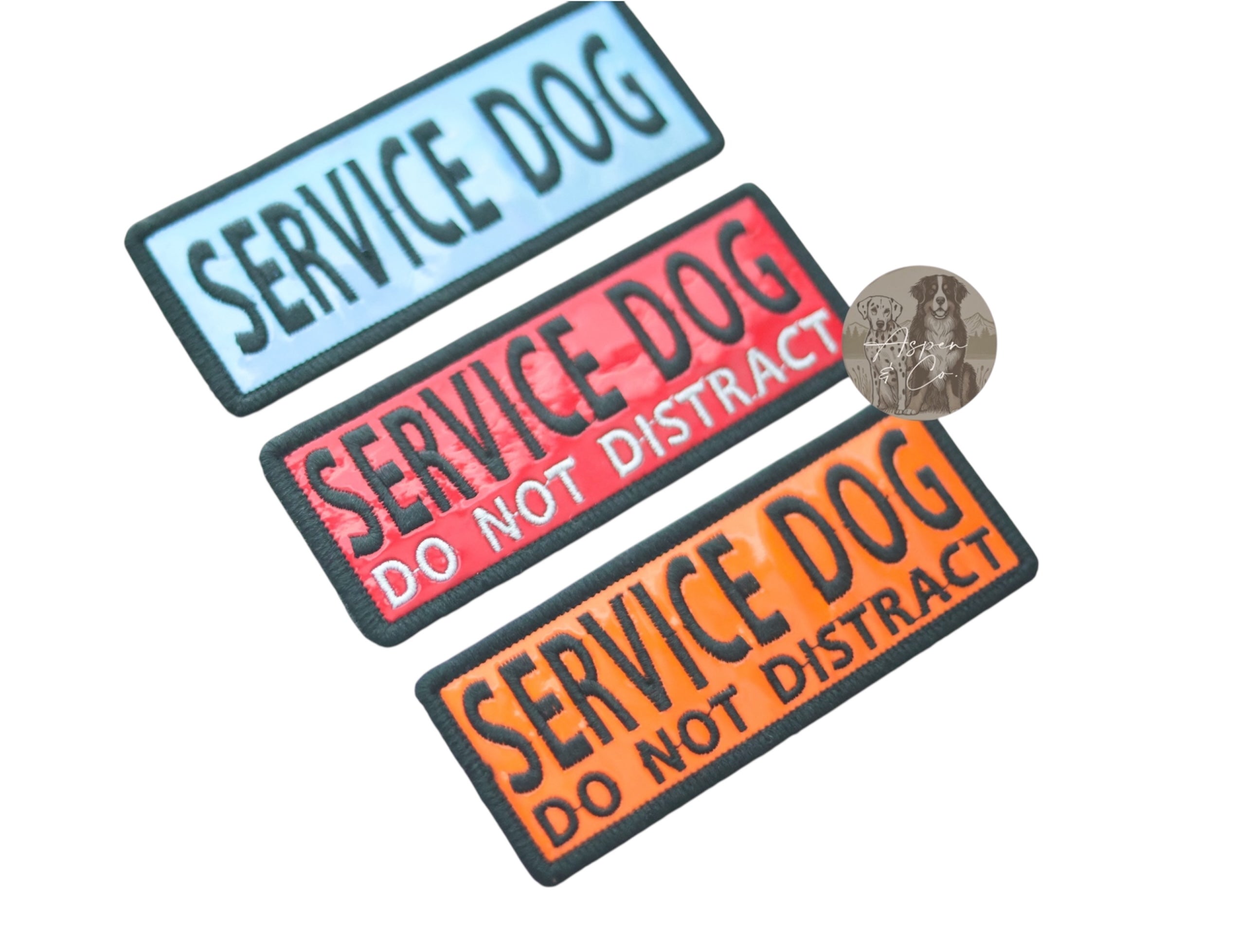 Blue, red, and orange 5x2 inch embroidered Service Dog and Service Dog In Training patches with holographic finish, designed for attaching to dog collars, harnesses, capes, or vests.