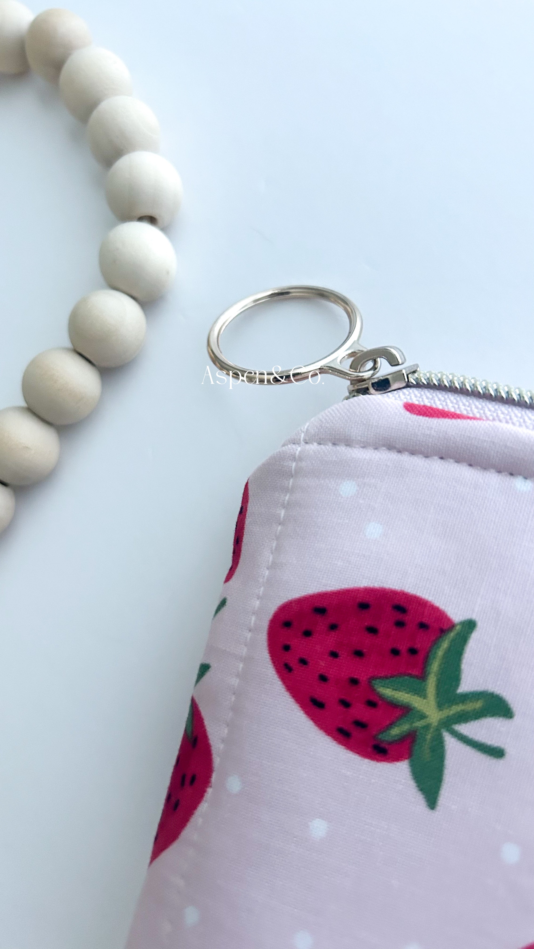 Handmade strawberry quilted book sleeve with zipper, zipper has cute ring design tab