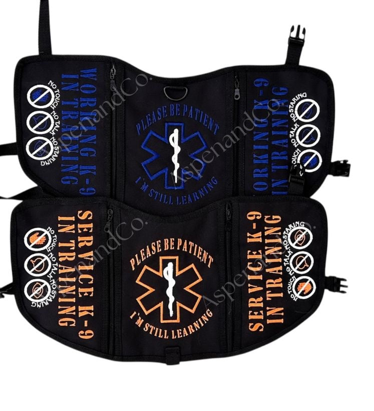 Black service dog vest with text and medical symbol on a white background