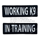 Two embroidered black hook-and-loop patches: “WORKING K9” and “IN TRAINING,” both in bold white thread. Includes text noting they are optional add-ons, 6x2" in size, and available bundled with vest orders.
